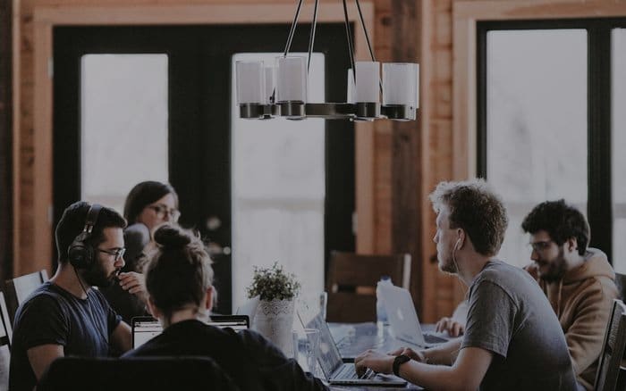 A service team answering questions side by side
